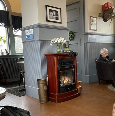 Cozy fireplace on a cold winters day.