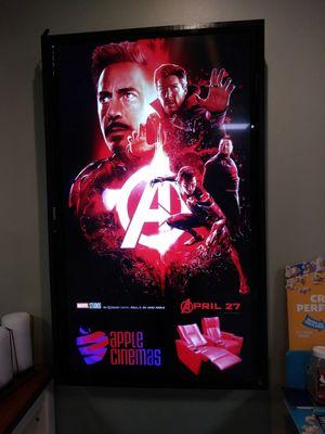 This movie poster is actually a flat screen turned sideways and the poster changes via USB. Really catches your eye. They have a bunch.