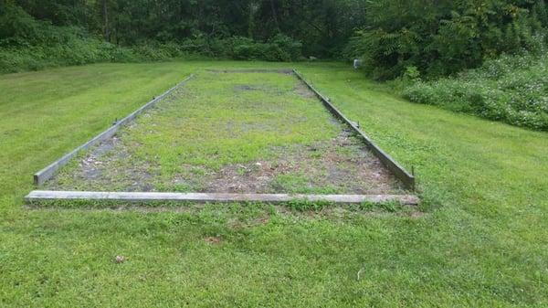 Run down bocce ball court.