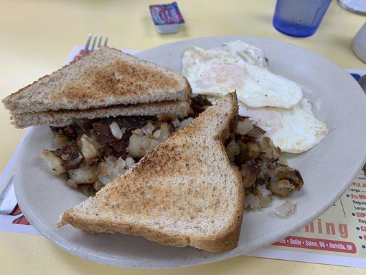 Jumbo reveille: two eggs, toast , hash browns and choice of meat. Dirt cheap!