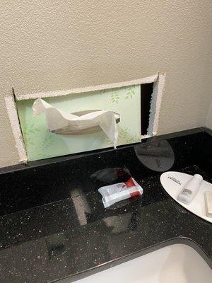 There was a nice hole in the wall where they placed a tissue box