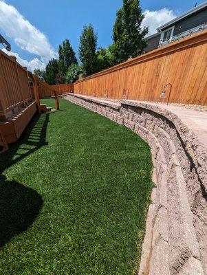 Retaining with artificial turf. Turf was done by just turf.