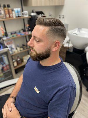 Mid fade with hard part