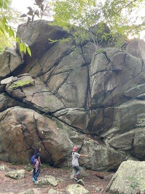 The huge glacial boulder seen in Moonlight Kingdom.  Summit the top for a grand view of the pond