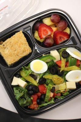 Garden Salad $13.99 with fresh fruit salad, focaccia bread, and homemade dressing (on the side)