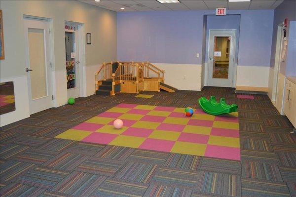 Infant/Toddler Gym used for gross-motor activities daily such as yoga, push toys, running and throwing balls!