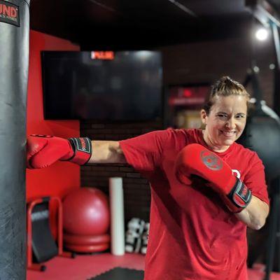 Coach "Kells Bells" is one of our Rock Star Trainers at 9ROUND Kickboxing Fitness in Fairlawn. She started as one of our founding members.