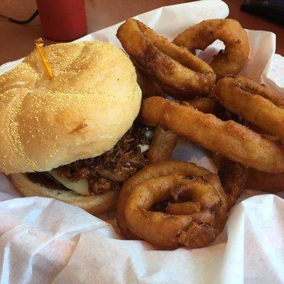 BBQ pulled pork & hamburger patty sandwhich. & the best onion rings ever!!