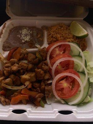 Chicken fajita. Plating... in a takeout box. I love this place.