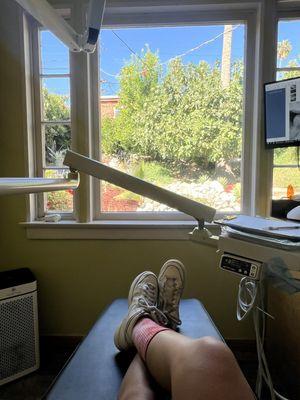 The beautiful view of a waterfall and greenery when you're at the dentist chair (: