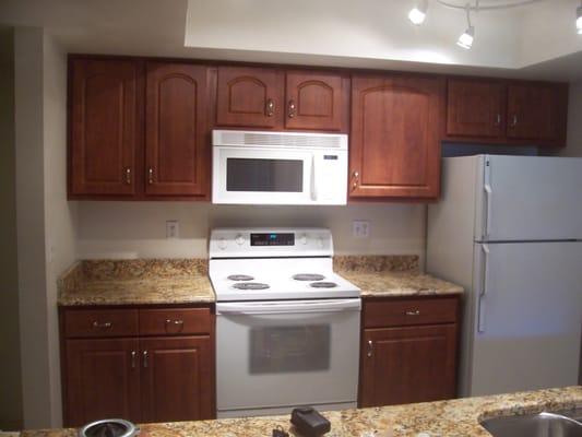 Refaced cabinets with granite counter tops