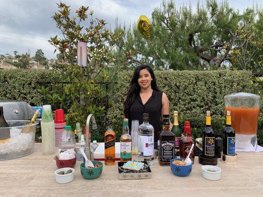 Our lovely bartender Tania bartending a birthday party.