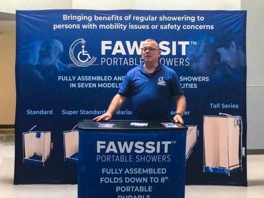 FAWSsit Showers Exhibit booth