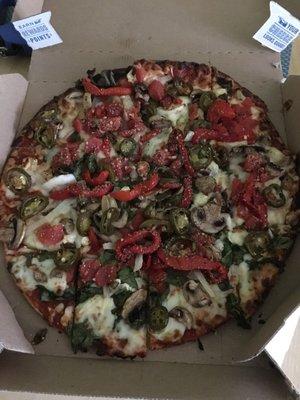 Pacific coast veggie pizza with jalapeños and no black olives