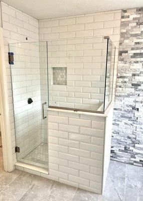 Custom shower with beveled subway tile