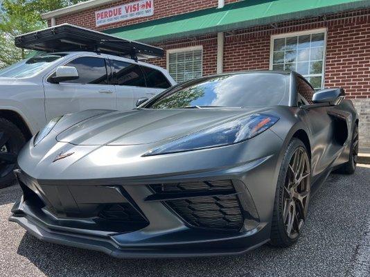 C8 Corvette wrapped in a Avery satin black stone metallic.