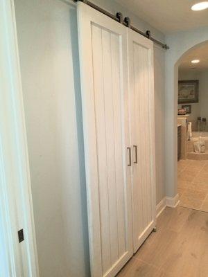 Barn doors custom built and installed. Double barn doors used for closet.