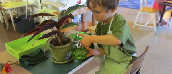 Children at work in the Practical Life area.