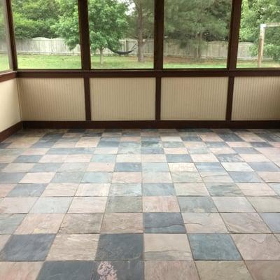 Newly installed slate tile in sunroom. Makes perfect eating area for family BBQs.