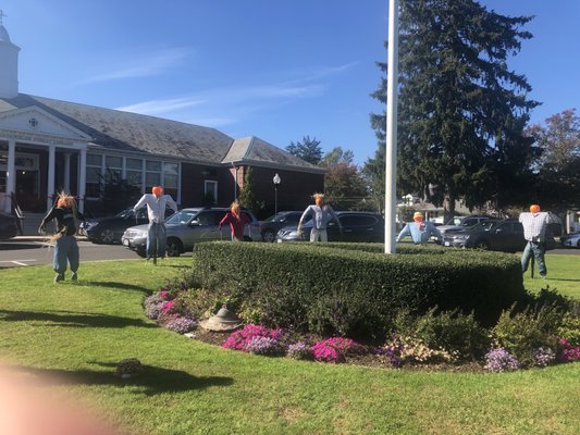 Scarecrows in circle area at library