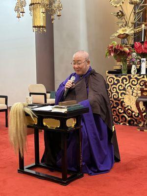 Bishop Komagata giving temple congregation his new year's greeting