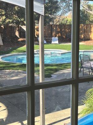 Our finished pool in the backyard from the family room windows.