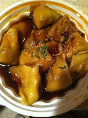 Pan fried wantons in garlic sauce. Nice tangy with a kick flavor.