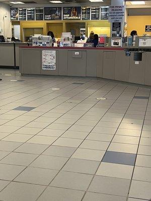 Empty counter with 4 workers standing around 6/1 10:50a Refused to assist with picking up mail