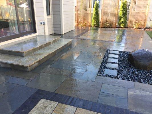 Large patio with water feature