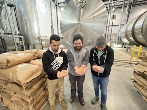 The WBM team holding their malt!