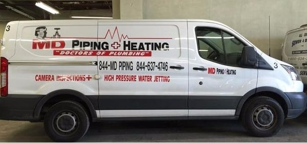 MD Piping & Heating specialized van.