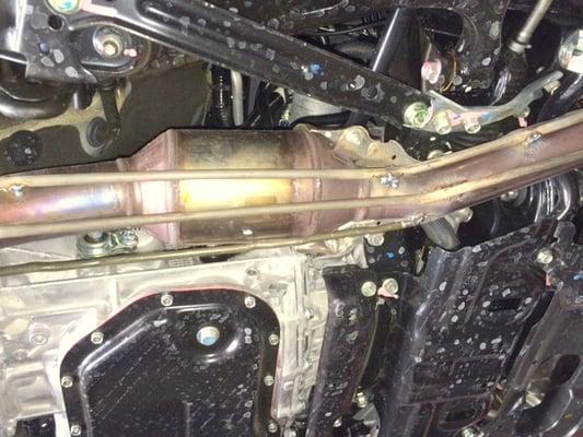 After: Custom catalytic converter cage we made.