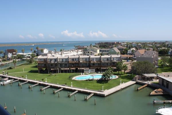 Great location! On the shipping channel in the heart of Port Aransas.  Marina with boat slip rentals and fishing pier.