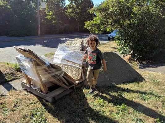 Huge slabs of patio stones, we spent hours breaking up. Gravel dumped on our grass despite the $100+ delivery fee and $25 gravel bin fee.