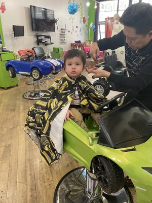 In his car, getting the 1st Haircut package.