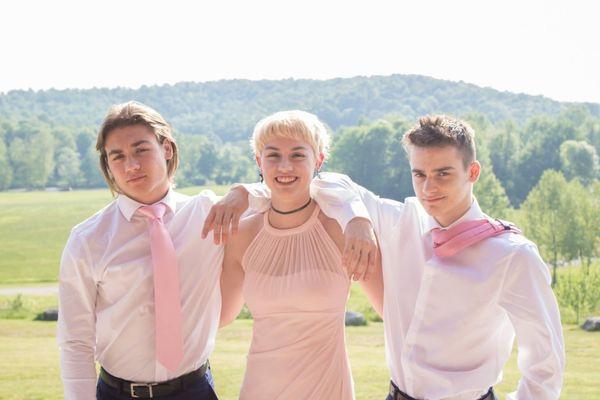 Siblings during beautiful outdoor wedding