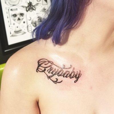 Script tattoo.