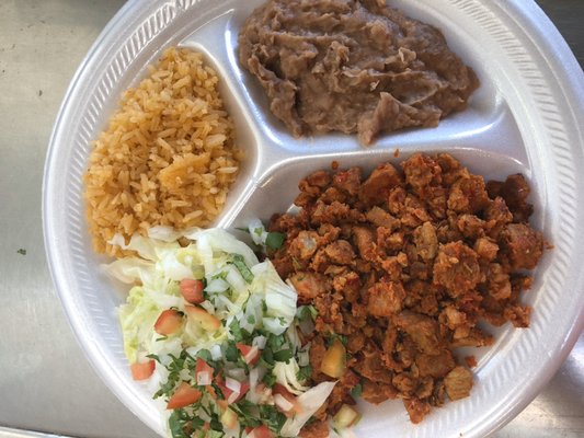 Al pastor plate with rice,beans and salad and with either flour or corn tortillas