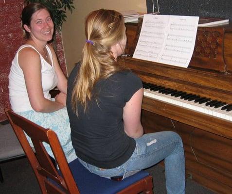 Audra our piano instructor with Hannah R.