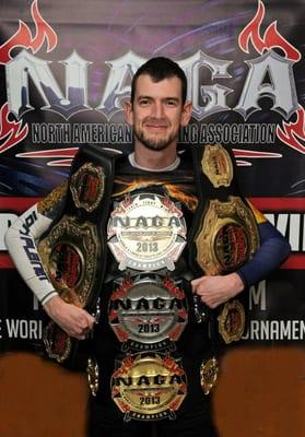 10th Planet Beaumont head instructor Brian Debes with his championship belts!!!