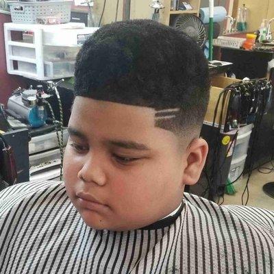 Kids haircut mid fade with afro shapeup