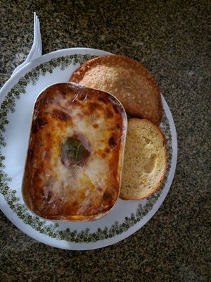 Eggplant lasagna, chicken empanada, garlic bread