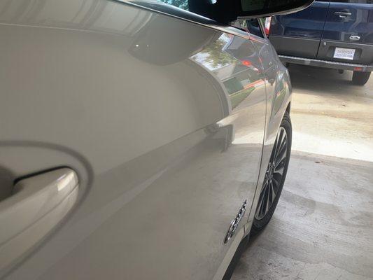 Passenger side door after Ding Company repaired the dent(s).