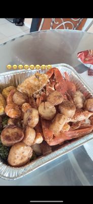 Broccoli Crab Legs Shrimp Corn And The scallops I made at home to add to my seafood platter