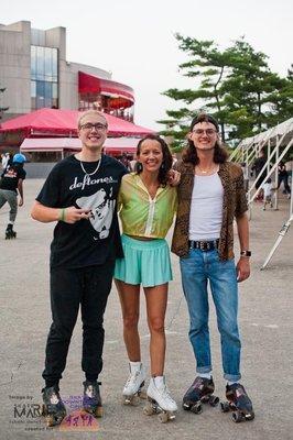 Skaters at the Cincy Socialights & Skate Downtown Cincy 90s roller party