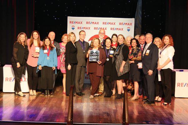 Our team accepting the award for #1 RE/MAX office in the state of LA for 2019