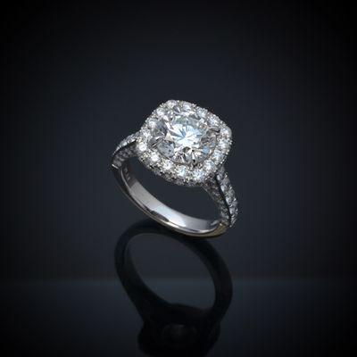 Custom made platinum diamond halo engagement ring with 2.50 Carat Round Brilliant GIA Certified Triple Excellent Natural Diamond.