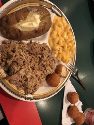 Pulled pork with baked potato and mac and cheese