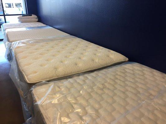 We have firm, pillowtop, memory foam, gel-infused foam, plush, and adjustable mattresses and frames available!