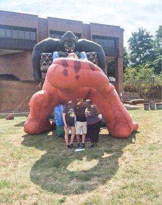 Large inflatable dinosaur slide.